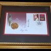 Queen Elizabeth II Golden Jubilee first day envelope with 'gold' 50c coin, signed by Sir Guy Green, Michael Jeffrey & Peter Hollingworth - framed
