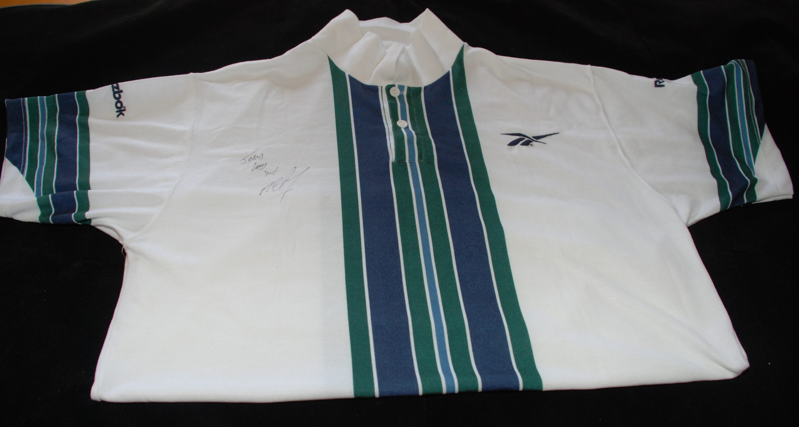 Michael Chang signed Reebok polo shirt